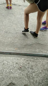 Muscular Legs in Shorts Street Candid