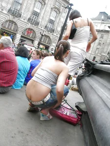 Girl in a Top and Low Rise Jeans with Ass Visible