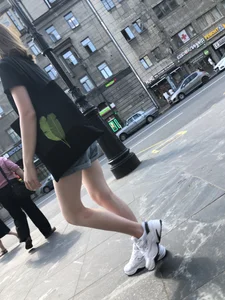 Candid Teen in Denim Shorts And Sneakers With Slim Legs Street Photos