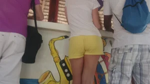 Milf in yellow shorts with vpl and a wedgie