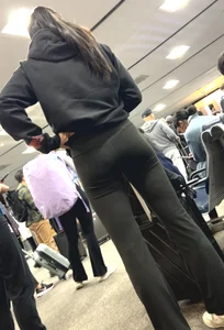 Tight asian lifts up short to show off booty to me at airport