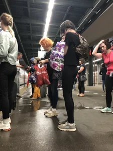 Teen Girl in Tights And Sneakers Standing on the Train Platform VPL Photos
