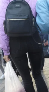 Juicy ass in black tight jeans and nice skinny legs street closeups