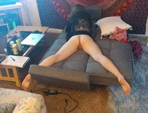 Unsuspecting girls lying on stomach