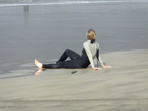 Candid surfer babes on the beach and in bikinis