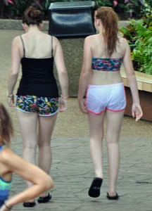 Couple of cute girls in wet shorts with decent asses