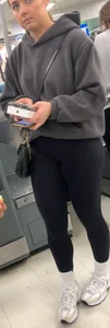 Perfect round ass showing off her long socks and black leggings