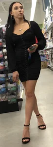 Brunette trophy wife in black dress