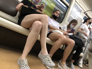 Candid Girl With Hot Long Crossed  Legs Sitting in a Subway Train Creepshots Gallery