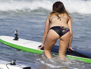 Candid surfer babes on the beach and in bikinis