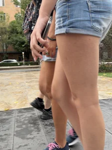 Candid teen wearing denim shorts passing by, nice legs