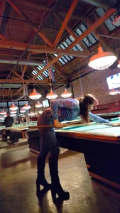 Milf in Tight Jeans playing pool