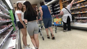 Cute brunette shopping with a nice ass in tight grey shorts with a wedgie