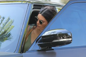 Kendall Jenner in West Hollywood with pokies and in tight jeans