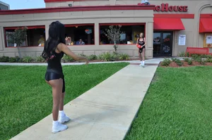 Candid sexy Hooters girls in their uniforms