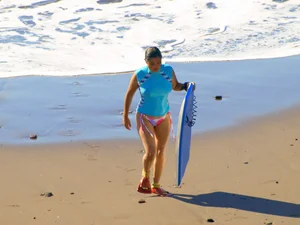 Candid surfer babes on the beach and in bikinis