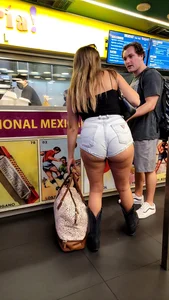 Big Ass Cheeks showing in tiny shorts in cowboy boots