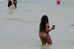 Ebony beach and bikini girls