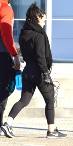 Brunette walking in leggings with a thick booty and showing some camel toe