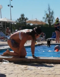 Sexy British girl in a bikini at the pool with camel toe