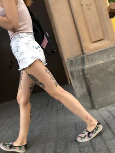 Skinny Girl in Denim Shorts With Fit Tattooed Legs Street Creepshots Gallery