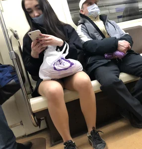Hot Girl in Pantyhose And a Skirt Creepshots Gallery in a Subway Train and on an Escalator