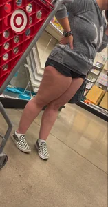 Almost busted by target security for this meaty mom showing cheeks