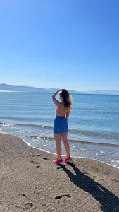 Milf in a skirt at the beach