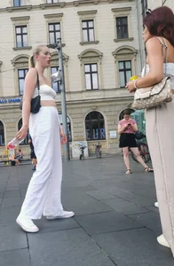 Long blonde braless in a white outfit (many pictures)