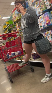 Almost busted by target security for this meaty mom showing cheeks