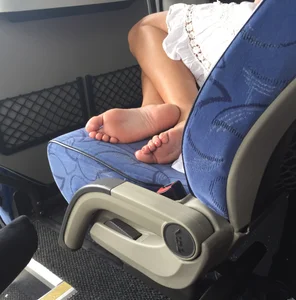 Barefoot candid girl asleep in the bus creepshots