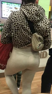 Brunette babe with a great ass in tight grey leggings