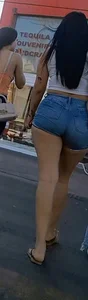 super sexy denim short shorts on this brunette with tremendous legs and big butt