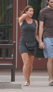 Curvy and beautiful lady in a short skirt with her man