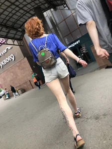 A Gorgeous Tall Ginger Girl in Shorts And Sandals With Tattooed Legs Street Creepshots