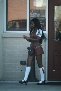 Sexy ebony Tilted Kilt employee in her uniform