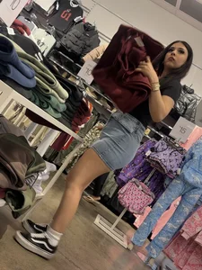Cute salesgirl with tight Jean skirt showing some legs (OC)