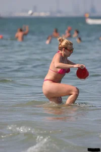 A bunch of sexy beach voyeur babes in bikinis, thongs and topless