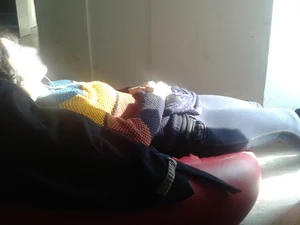 Candid Girl in Blue Skinny Jeans Sleeping on a Beanbag in the Sun, Slim Sexy Legs