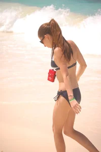 Various sexy candid girls in bikinis at the beach