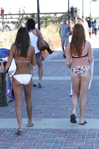 Two cute teens in bikinis