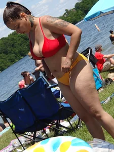 Thick girl with tattoos, big tits and a big booty in a little bikini