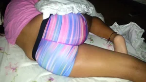 Girlfriend sleeping in colored Nike spandex shorts with a nice ass