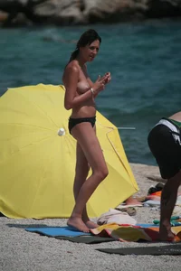 3 amazing topless girls on a nudist beach