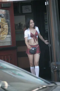 Two sexy Tilted Kilt employees showing cleavage and cheeks