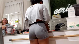 Candid ebony babe with an amazing ass and vpl in grey Nike spandex shorts