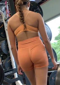Innocent teen in see through orange spandex shorts, thick brunette in soft gray spandex shorts