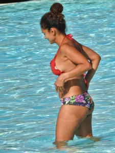 Hot ass milf with an amazing body at the pool
