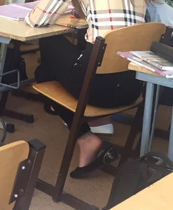 Skinny Teen’s Booty in Tight Black Jeans And Crossed Legs - Feet in Dangle Flats