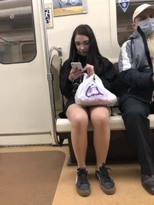 Hot Girl in Pantyhose And a Skirt Creepshots Gallery in a Subway Train and on an Escalator
